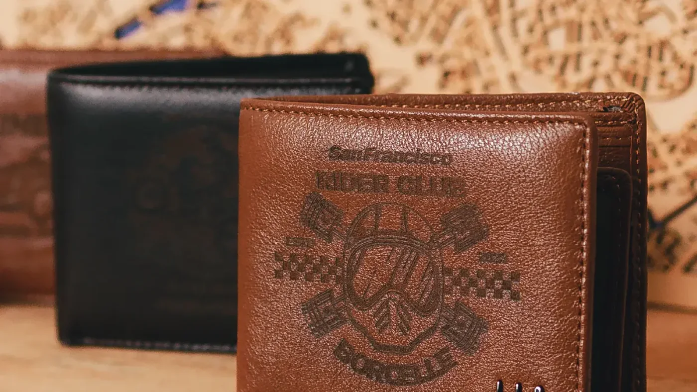 Brown leather wallet engraved with a detailed San Francisco soccer design