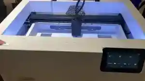 Przycisk automatycznego ustawiania ostrości Ador