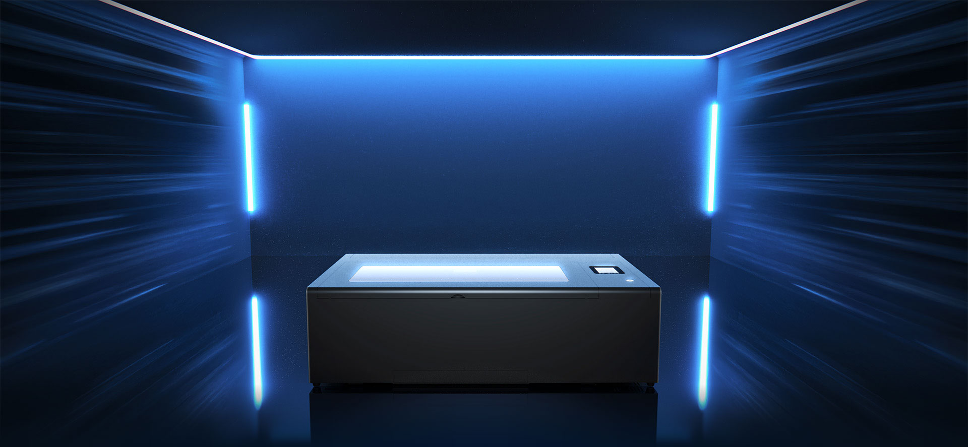 Beambox II desktop laser cutter on a workbench.